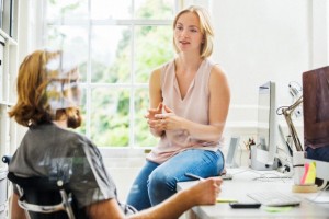 Woman and man working in office