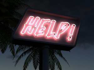 a huge neon sign displaying the word "help"
