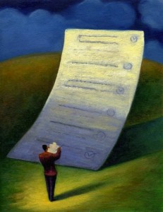 Businessman standing infront of a large checklist